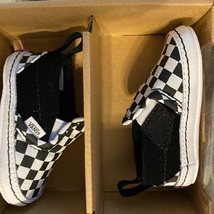 Brand new in the box never worn baby vans white and black checker